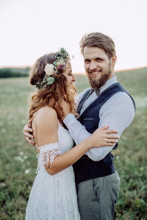 Happy newlyweds outside after wedding
